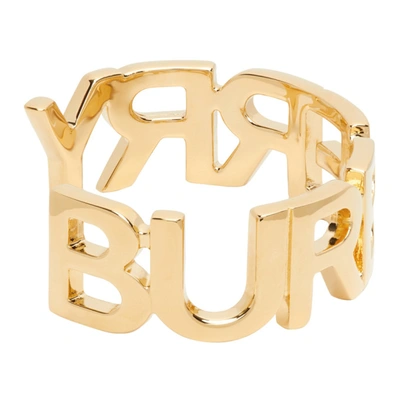 Shop Burberry Gold Logo Cuff Bracelet In Light Gold