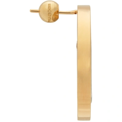 Shop Burberry Gold Monogram Motif Earrings In Light Gold