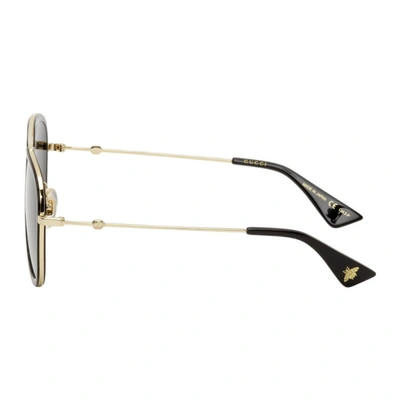 Shop Gucci Gold & Black Aviator Sunglasses In 011