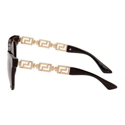 Shop Versace Black Greca Cat-eye Sunglasses In Gb1/87 Blk