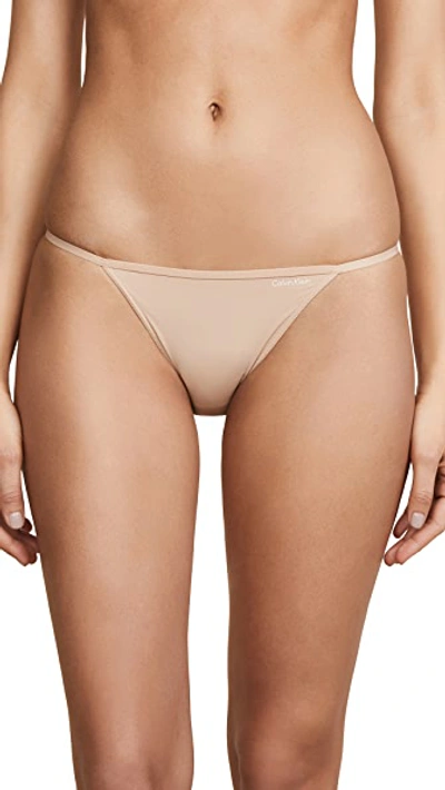 Shop Calvin Klein Underwear Sleek String Bikini Panties In Bare