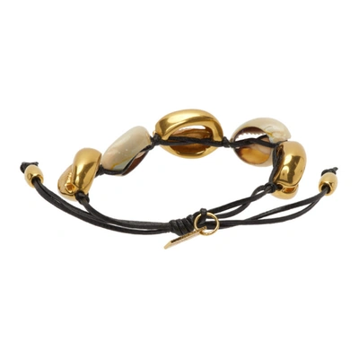 Shop Saint Laurent Black & Gold Cowrie Shell Bracelet In 1020 Black/natural