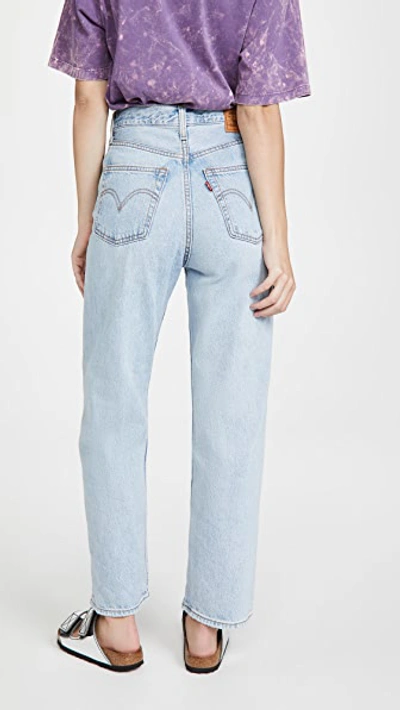 Levi's Ribcage High Waisted Flares In Light Wash Blue In Middle Road