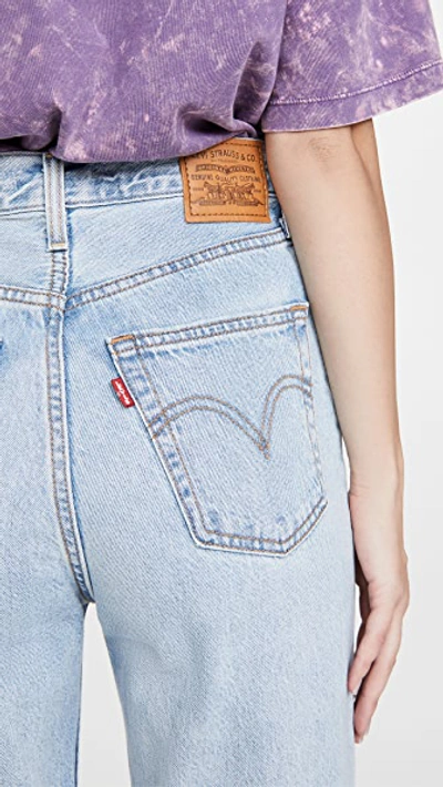 Levi's Ribcage High Waisted Flares In Light Wash Blue In Middle Road