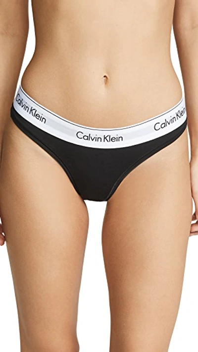Shop Calvin Klein Underwear Modern Cotton Thong Black