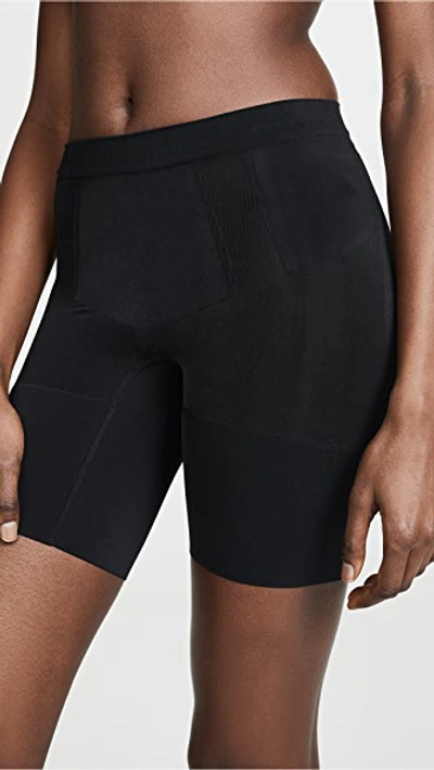 Shop Spanx Oncore Mid Thigh Shorts In Very Black