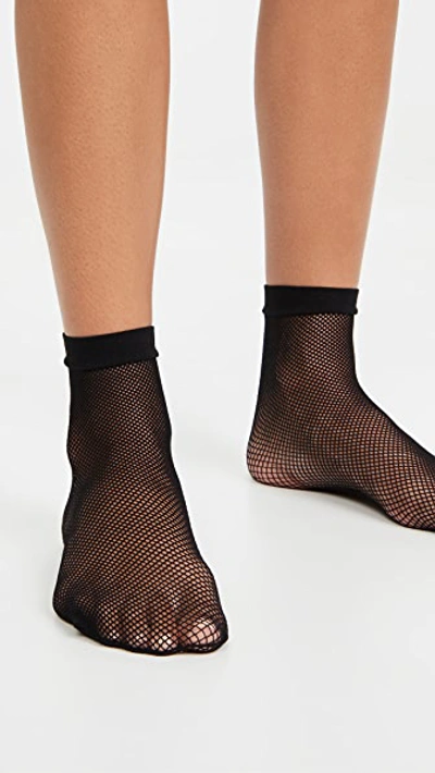 Shop Stems Micro Fishnet Sneaker Socks In Black