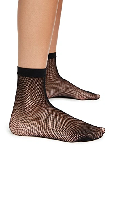 Shop Stems Micro Fishnet Sneaker Socks In Black