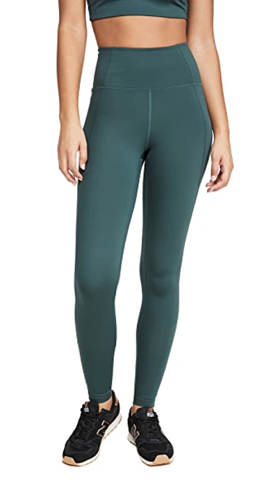 Shop Girlfriend Collective High Rise Compressive Leggings In Moss