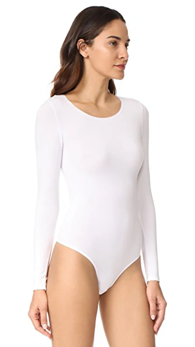 Shop Yummie Shaping Thong Bodysuit In White