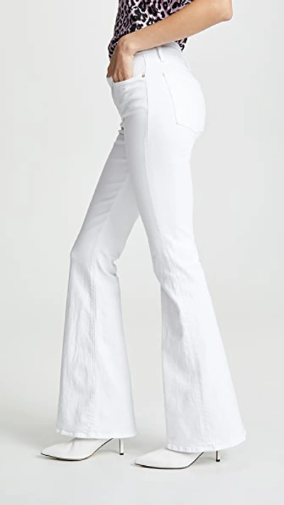 Shop Frame Le High Flare Jeans Blanc