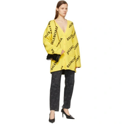 Shop Balenciaga Yellow Allover Logo Cardigan In 7440 Yellow/black