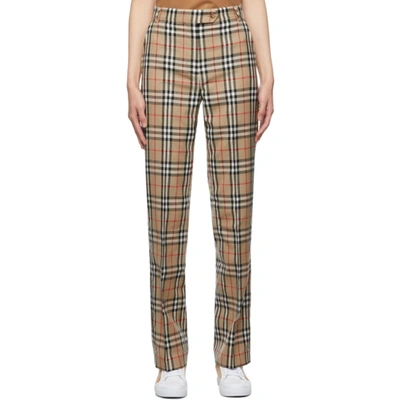 Shop Burberry Beige Vintage Check Trousers In Archive Beige Ip Chk