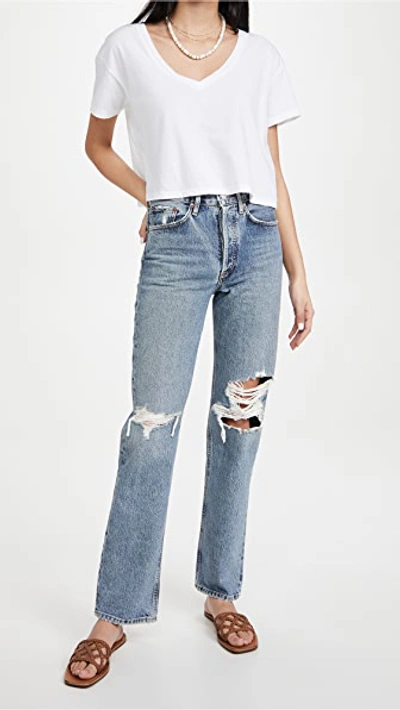 Shop Agolde Lana Mid Rise Straight Jeans Backdrop