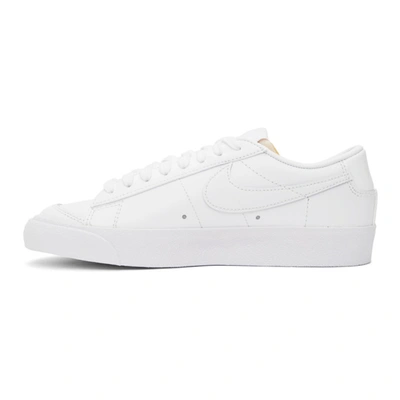 Shop Nike White Blazer Low '77 Sneakers In White/white-white-wh