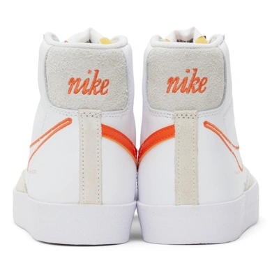 Shop Nike White Blazer Mid '77 Se Sneakers In White/orange-summit