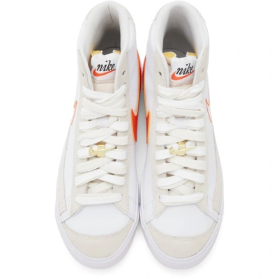 Shop Nike White Blazer Mid '77 Se Sneakers In White/orange-summit