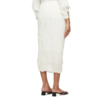 Shop Totême Off-white Silk Crinkled Slip Skirt