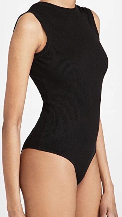 Shop Agolde Sutton V Back Cap Sleeve Bodysuit In Black