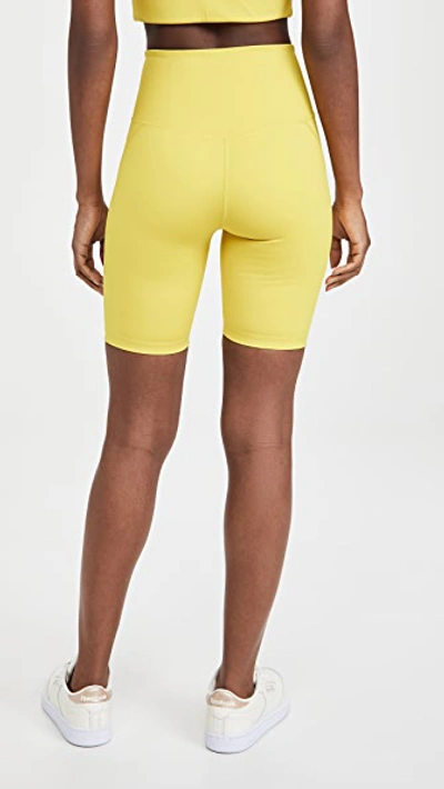 Shop Girlfriend Collective High Rise Bike Shorts In Chartreuse