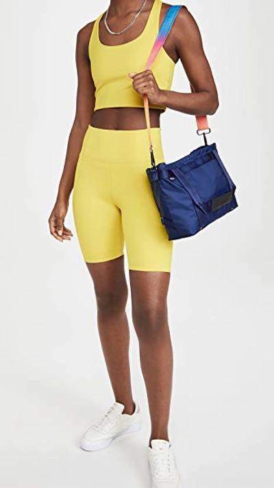 Shop Girlfriend Collective High Rise Bike Shorts In Chartreuse