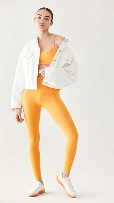 Shop Beyond Yoga High Waisted Midi Leggings In Sunny Citrine Solid