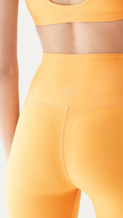 Shop Beyond Yoga High Waisted Midi Leggings In Sunny Citrine Solid