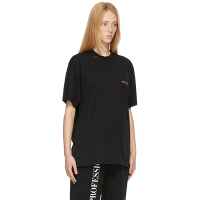 Shop Vetements Black & Gold Logo T-shirt