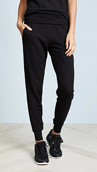 Shop Beyond Yoga Cozy Fleece Sweatpants In Black