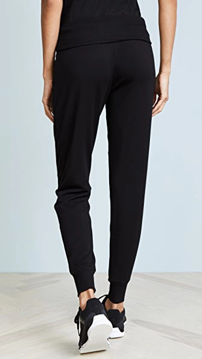 Shop Beyond Yoga Cozy Fleece Sweatpants In Black