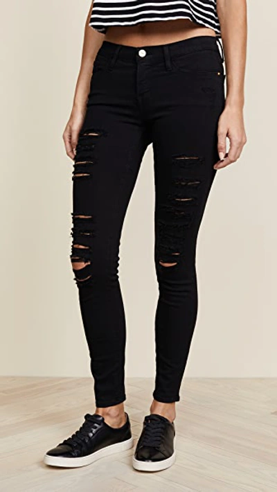 Shop Frame Le Color Rip Skinny Jeans In Film Noir