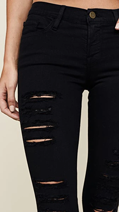 Shop Frame Le Color Rip Skinny Jeans In Film Noir