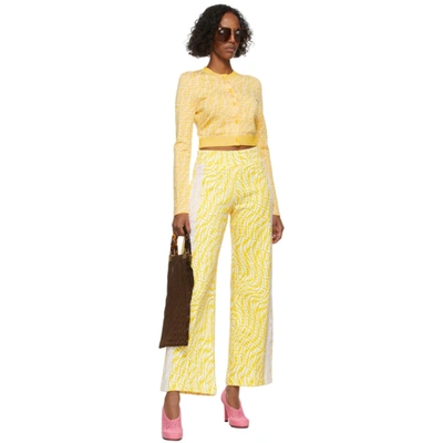 Shop Fendi Yellow Ff Fish Eye Flared Trousers In F1do6 Welle