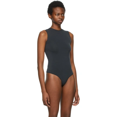Shop Skims Black Essential Thong Bodysuit In Onyx
