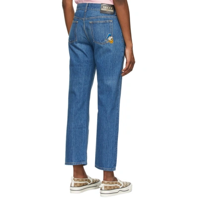 Shop Gucci Blue Disney Edition Eco-washed Donald Duck Jeans In 4447 Blue