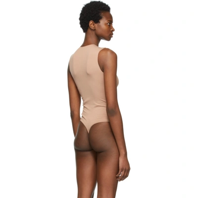 Shop Skims Beige Essential Thong Bodysuit In Tigers Eye