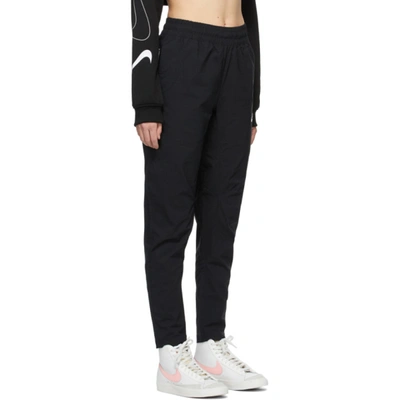 Shop Nike Black Woven Sportswear Lounge Pants In 010 Black/i