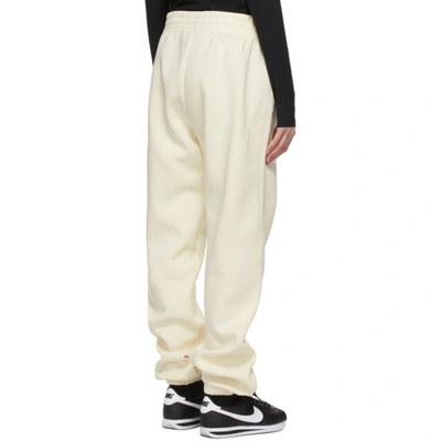 Shop Nike Yellow Fleece Sportswear Essential Lounge Pants In Coconut Milk/white