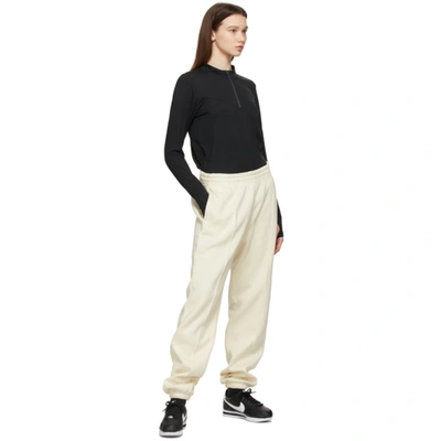 Shop Nike Yellow Fleece Sportswear Essential Lounge Pants In Coconut Milk/white