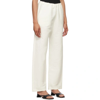 Shop Totême White Stretch Linen Lounge Pants In City White