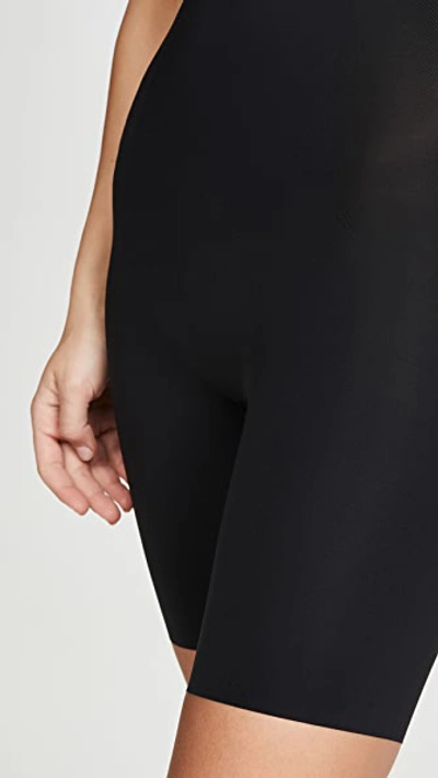 Shop Spanx Thinstincts High Waisted Mid-thigh Shorts In Very Black
