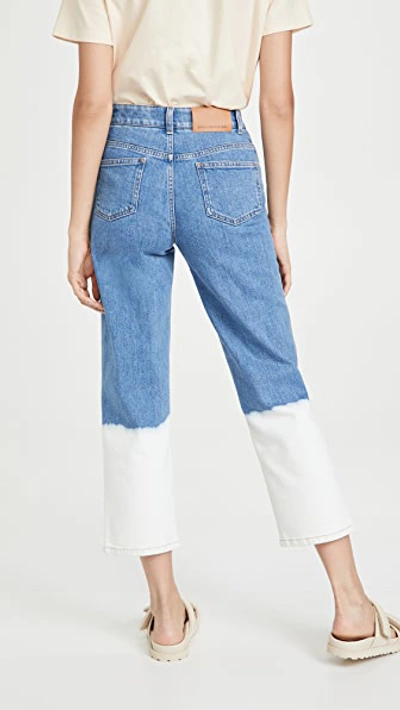 Shop Stella Mccartney Dip Faded Hem Wash Trousers In Medium Blue