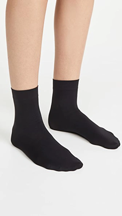 Shop Wolford Aurora 70 Socks In Black