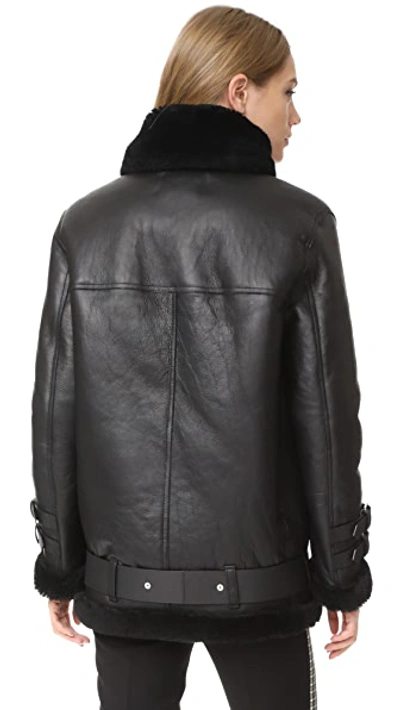 Shop Acne Studios Velocite Shearling Moto Jacket In Black/black