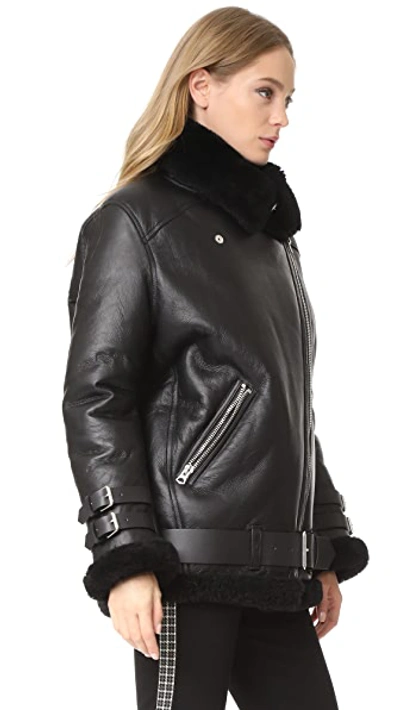 Shop Acne Studios Velocite Shearling Moto Jacket In Black/black