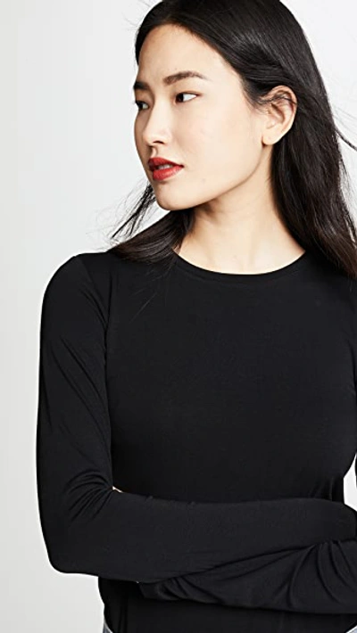 L Agence Tess Long Sleeve Stretch Jersey Top In Black