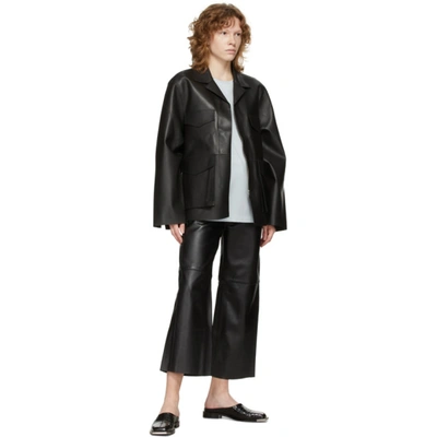 Shop Totême Black Wide Leather Trousers In 200 Black
