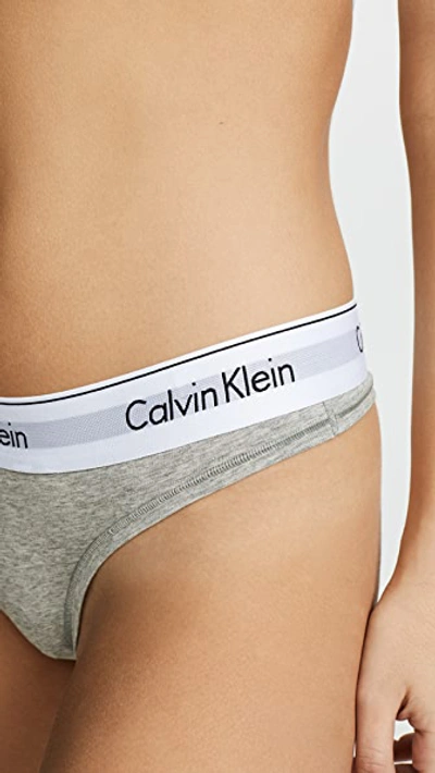 Shop Calvin Klein Underwear Modern Cotton Thong Heather Grey