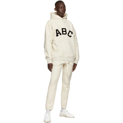 Shop Fear Of God Off-white 'abc' Hoodie In 101 Cream Heather