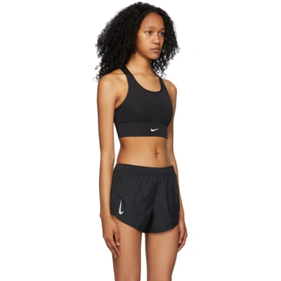 Shop Nike Black Swoosh Long Line Sports Bra In 010 Black/white